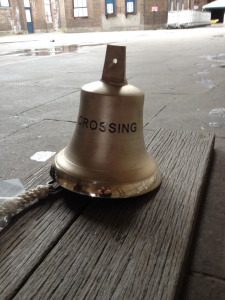 The Bell from the installation with "crossing" written on it