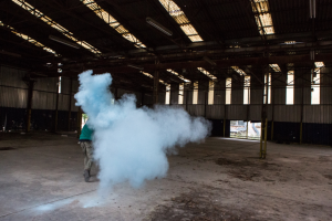 Installation photo showing smoke in a large building